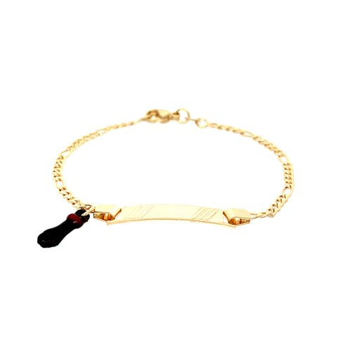 The Kids Bracelet with Black Figa Hand Charm and Plate features a Figaro link design in 14k gold-filled material, complete with a rectangular engravable plate at its center and a delightful black and red, sock-shaped enamel charm, making it perfect for children.